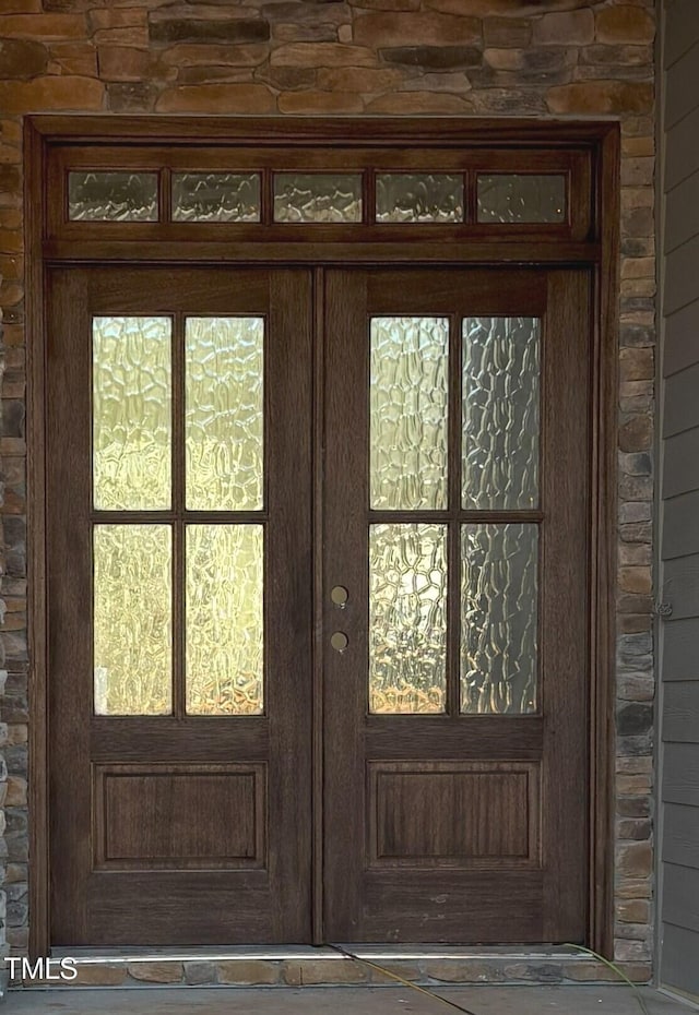 doorway to property with french doors