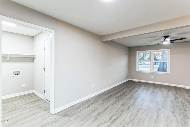 spare room featuring ceiling fan and light wood-type flooring