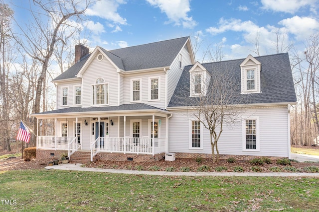 view of front of house with a front yard and covered porch