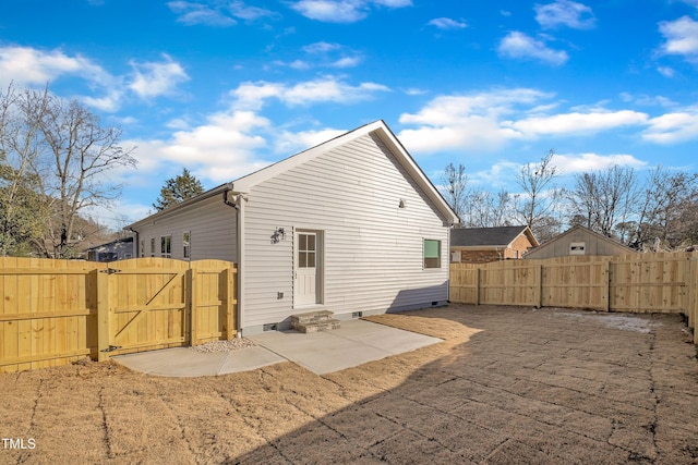 back of property with a patio area