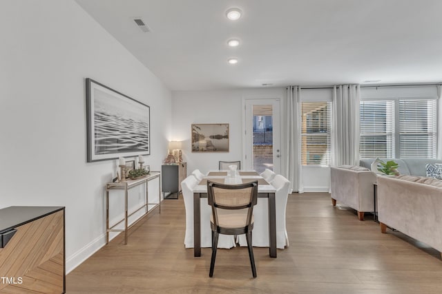 dining area with light wood-type flooring