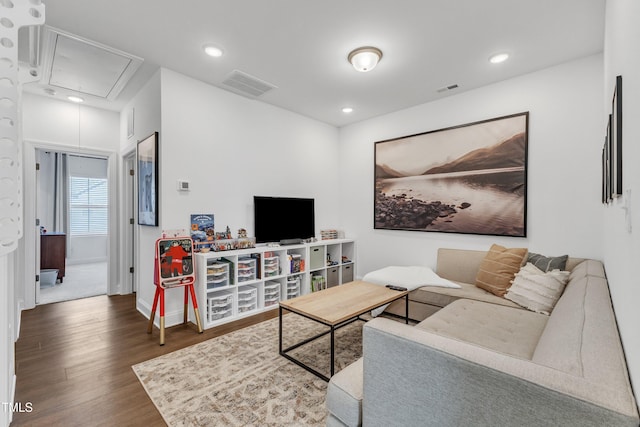 living room featuring dark hardwood / wood-style floors