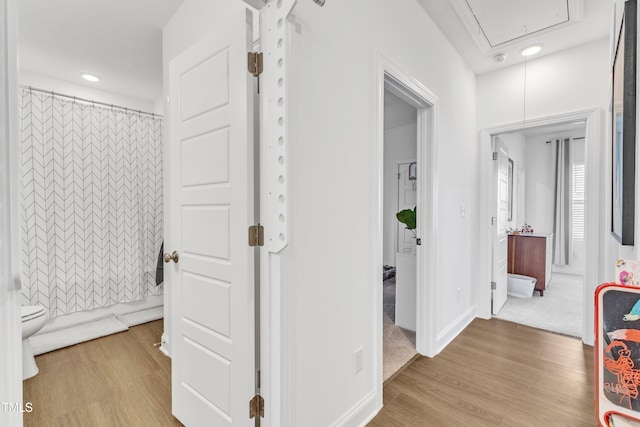 corridor featuring light wood-type flooring