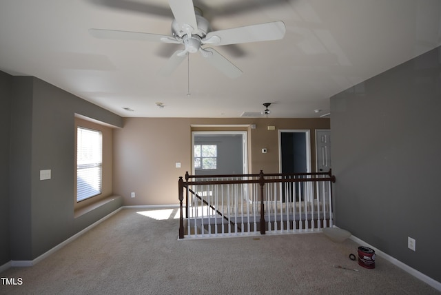 spare room with light colored carpet