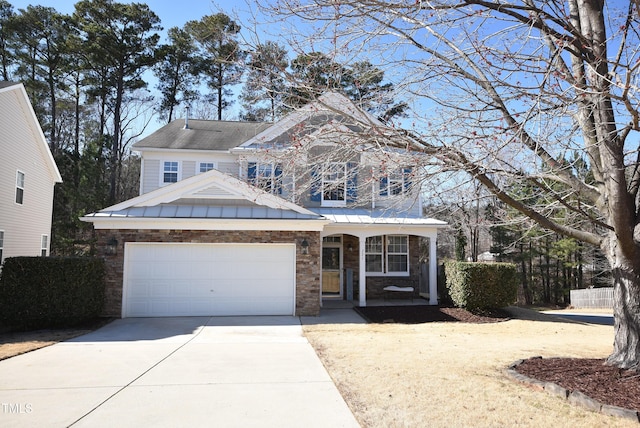 view of front of property with a garage