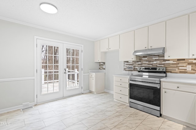 kitchen with decorative backsplash, crown molding, white cabinetry, stainless steel range with electric cooktop, and french doors