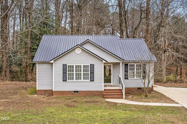 view of front of property featuring a front yard