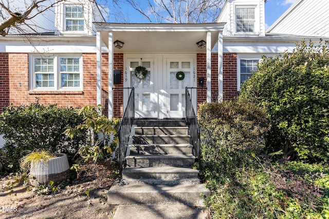 doorway to property featuring cooling unit