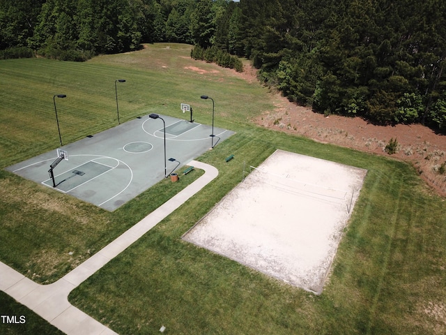 view of basketball court with a yard, volleyball court, and community basketball court