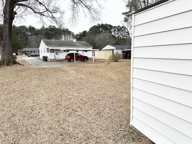 view of yard with a carport