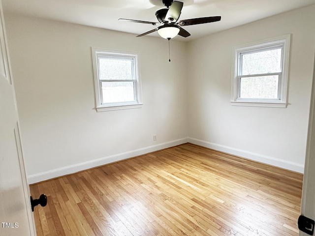 unfurnished room with light hardwood / wood-style flooring and ceiling fan