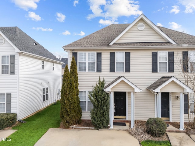 view of front of home with a front lawn