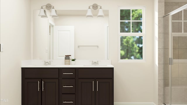 bathroom with an enclosed shower and vanity