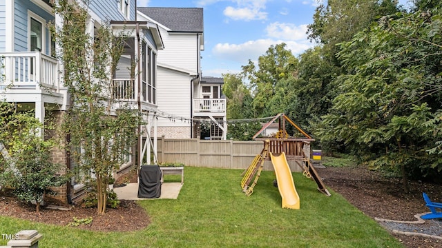 view of jungle gym with a yard