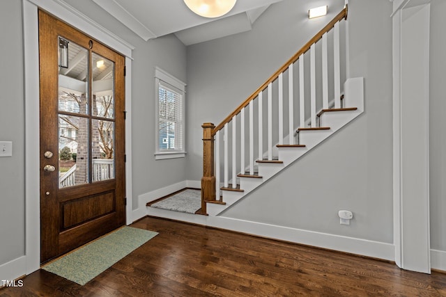 foyer entrance with dark hardwood / wood-style flooring