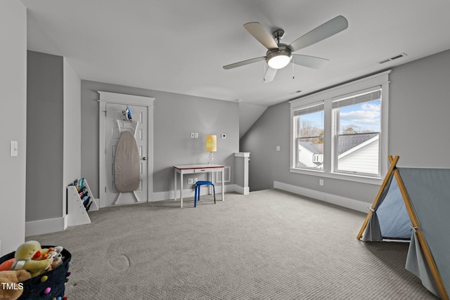 rec room featuring ceiling fan, lofted ceiling, and carpet floors