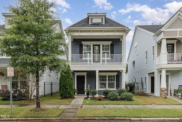 view of front of property with a balcony