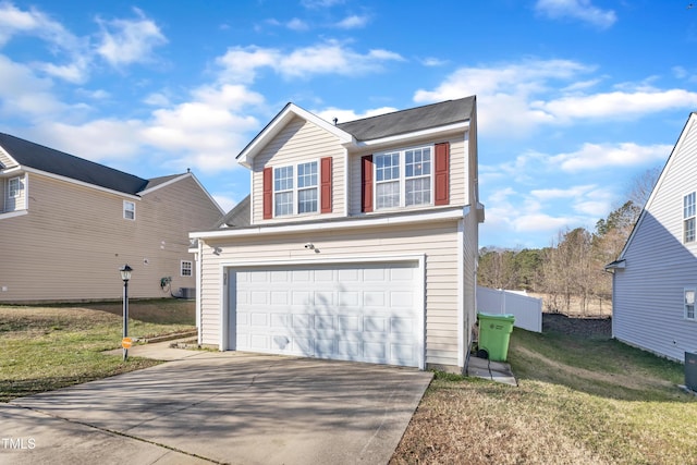 exterior space featuring a garage and a front yard