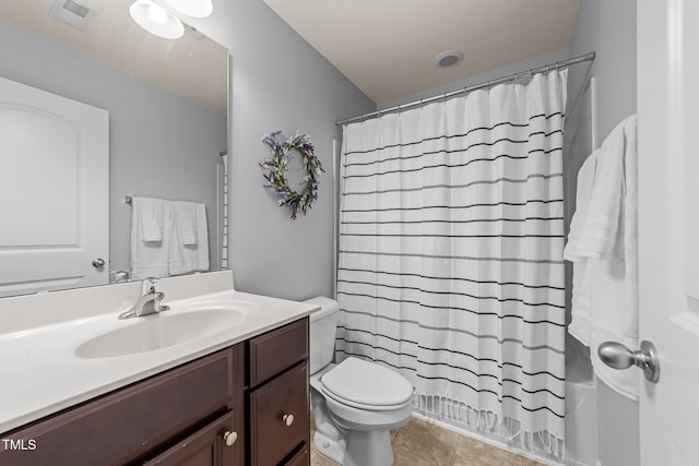 full bathroom with vanity, toilet, tile patterned floors, and shower / tub combo with curtain