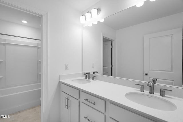 1264 Hardin Hill Ln, Knightdale, NC 27545 - full bath featuring double vanity, shower / washtub combination, and tile patterned flooring