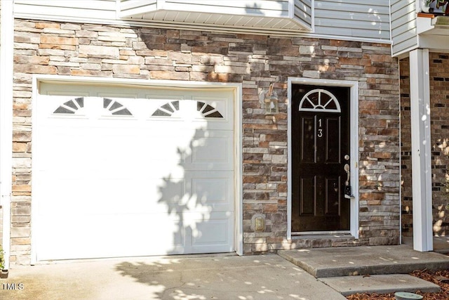 property entrance featuring a garage