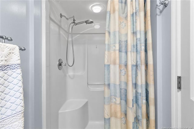 bathroom featuring walk in shower