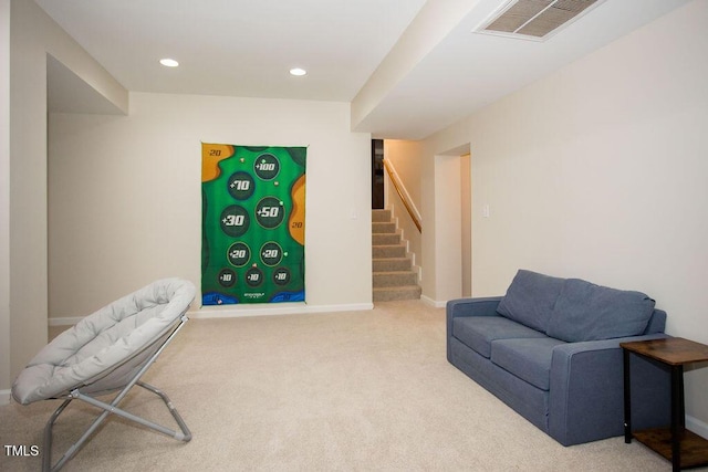 sitting room with carpet flooring