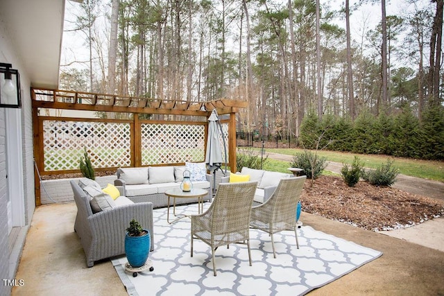 view of patio / terrace with an outdoor living space and a pergola