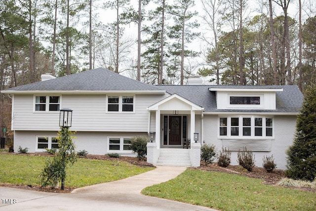 view of front of home with a front lawn