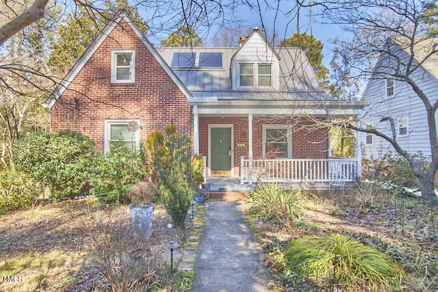 view of front of property featuring covered porch