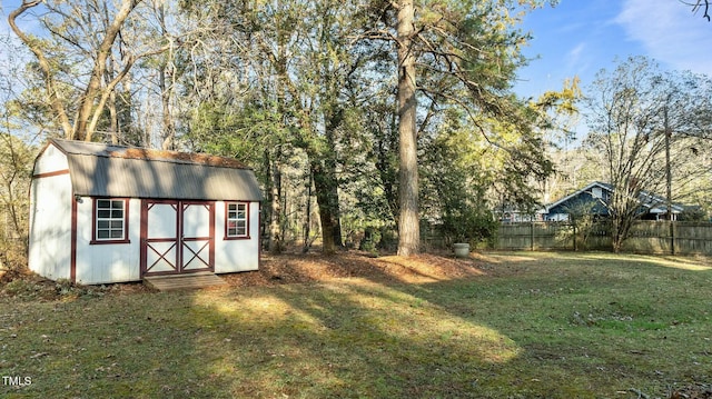 view of outdoor structure with a yard