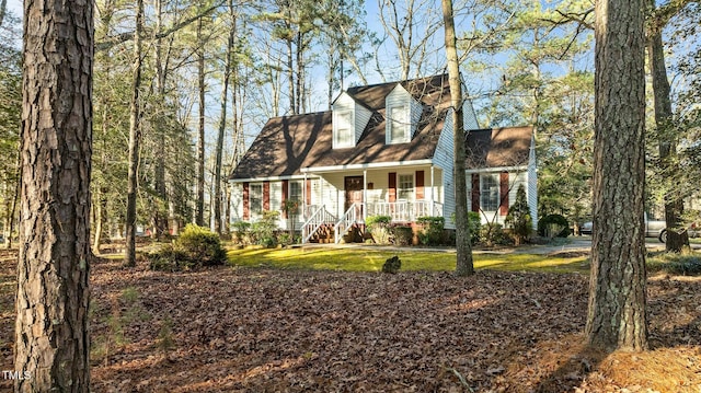 cape cod home with a porch