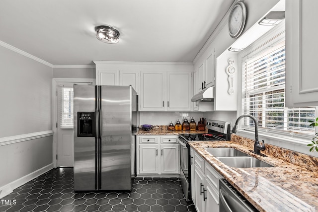 kitchen featuring sink, white cabinetry, light stone counters, decorative backsplash, and stainless steel appliances