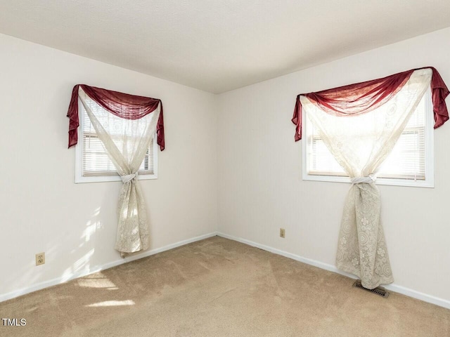 view of carpeted spare room