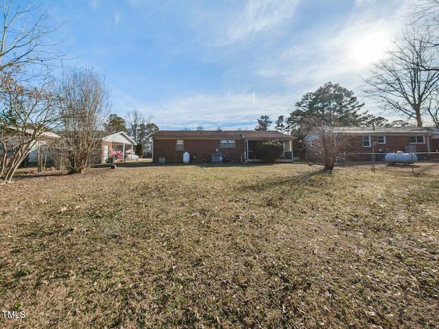 view of yard featuring a carport