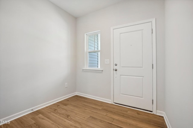 doorway to outside with light hardwood / wood-style floors