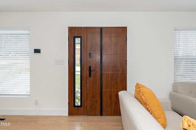 entrance foyer featuring light hardwood / wood-style floors