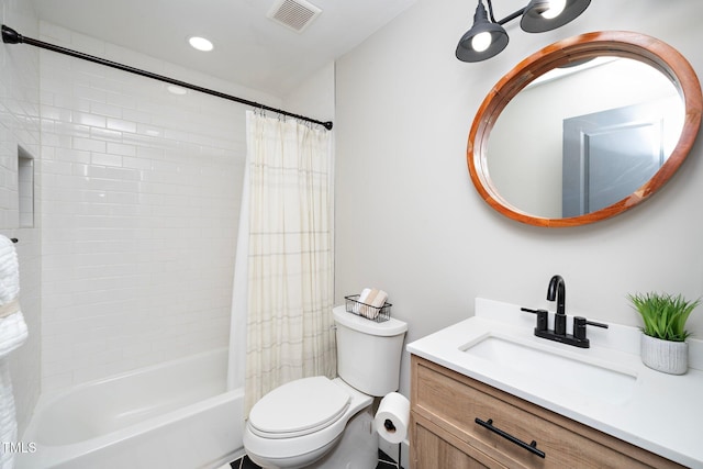 full bathroom featuring vanity, toilet, and shower / bathtub combination with curtain