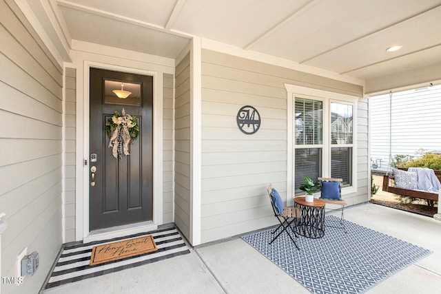 entrance to property with covered porch