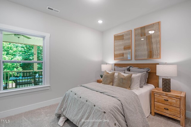 bedroom with light colored carpet, visible vents, baseboards, and recessed lighting