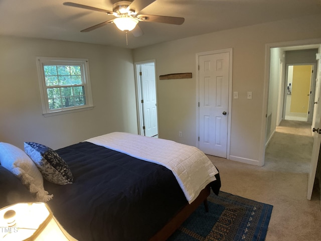 carpeted bedroom featuring ceiling fan