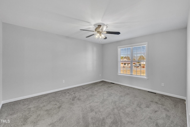 unfurnished room featuring carpet and ceiling fan