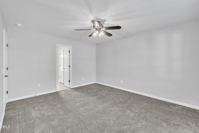 empty room featuring carpet and ceiling fan