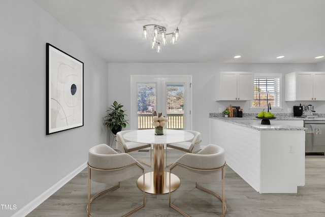 dining space featuring light hardwood / wood-style floors