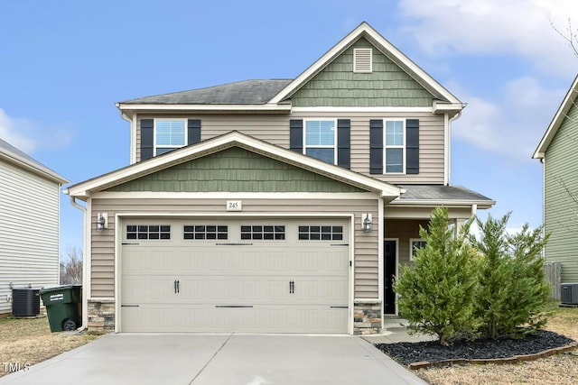 craftsman-style house featuring central AC