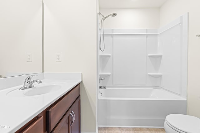 full bathroom featuring toilet, tub / shower combination, and vanity