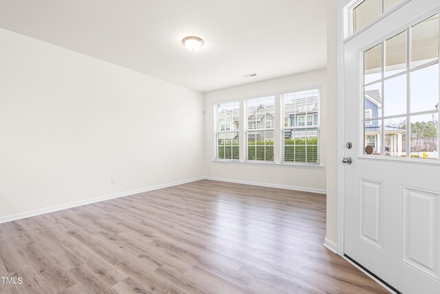 interior space with light hardwood / wood-style flooring