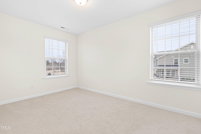 view of carpeted spare room