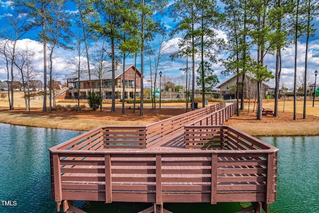 dock area with a water view