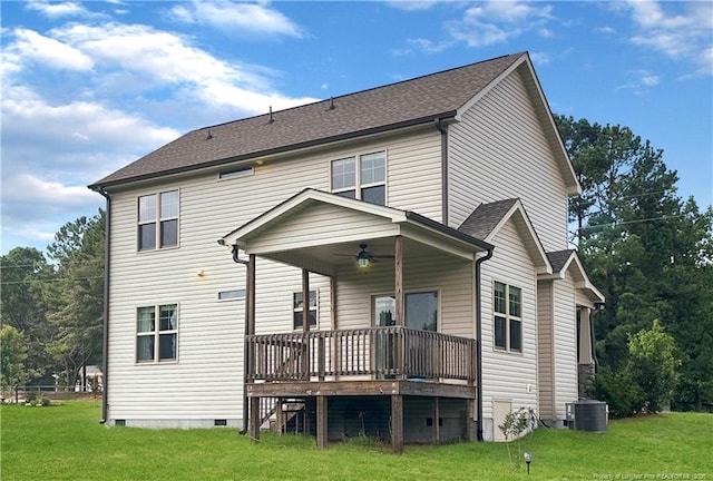 back of property featuring a lawn, central air condition unit, ceiling fan, and a wooden deck